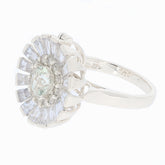 Round green amethyst sterling silver ring with sparkling accent stones, showcasing elegance and luxury.